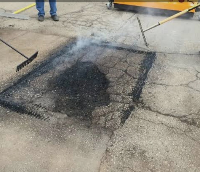 Pothole damage before thermal repair