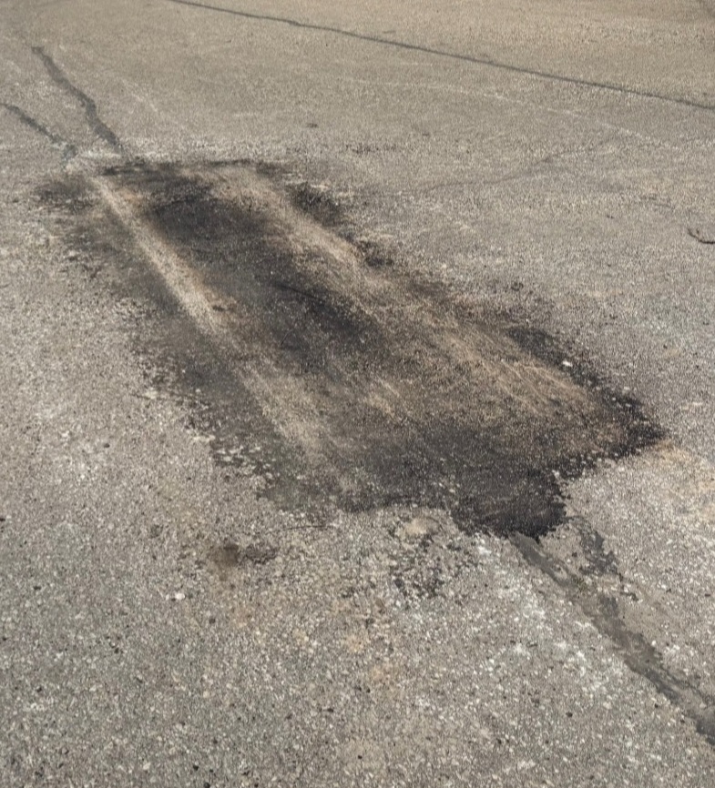 Pothole before — water pooling